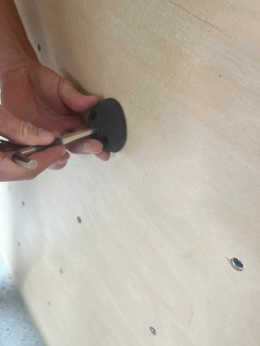 Close-up of panel surface with T-nuts on overhang