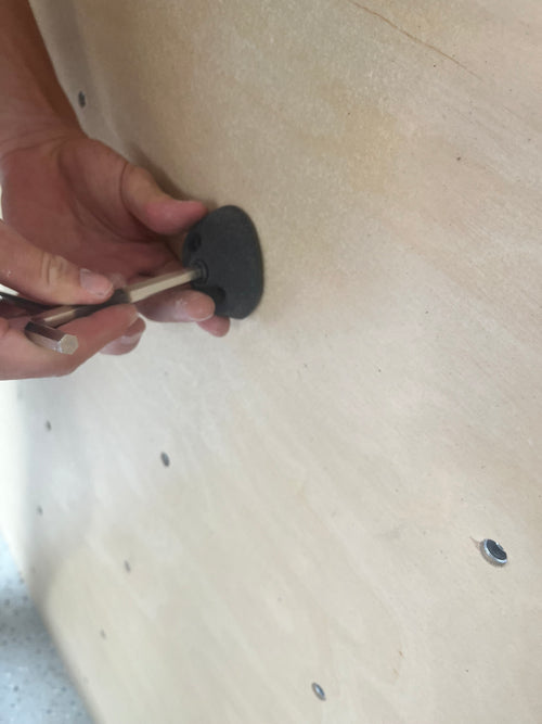 Close-up of panel surface with T-nuts on overhang